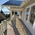Wood patio deck surround custom built to a house