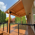 Wood patio deck custom built to a home